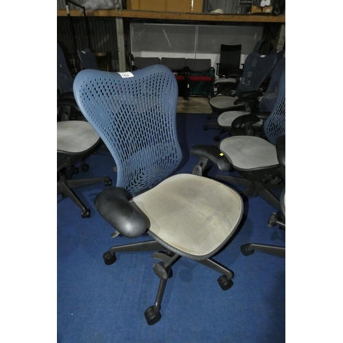 1424 - 1 x Herman Miller Mirra office swivel chair with grey mesh seat and dark blue plastic back