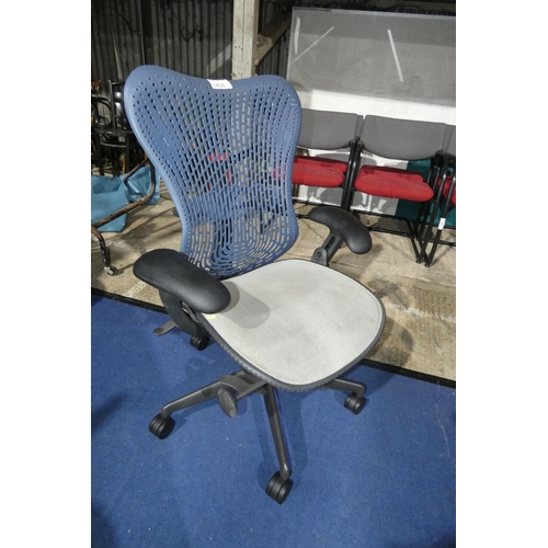 1430 - 1 x Herman Miller Mirra office swivel chair with grey mesh seat and dark blue plastic back