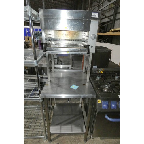 1189 - A commercial stainless steel steakhouse grill by Electrolux, eye height on a stand and prep table ap... 