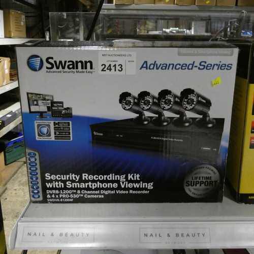 2413 - A boxed CCTV security recording kit by Swan type SWDVK-812004F, appears unused - trade