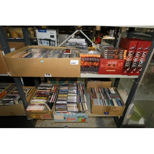 2449 - A large quantity of various DVDs and CDs, contents of 2 shelves, includes set of Inspector Morse mag... 