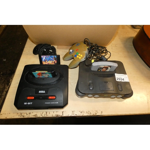 2534 - A Sega Mega Drive II games console, no AV cable & a Nintendo 64 games console, no power unit, 3 game... 