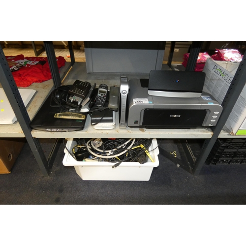 2555 - A quantity of various electronic related items including a printer, routers, scanner etc. contents o... 