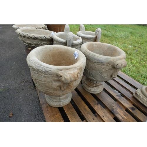 2685 - 2 large goblet style concrete planters