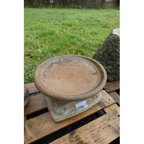 2700 - A low round concrete bird bath