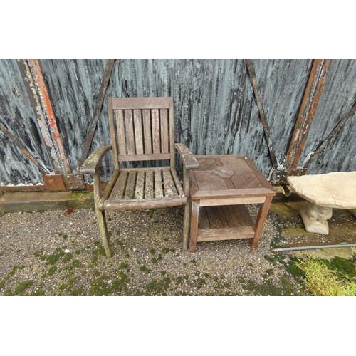 2708 - A wooden garden table and 1 chair