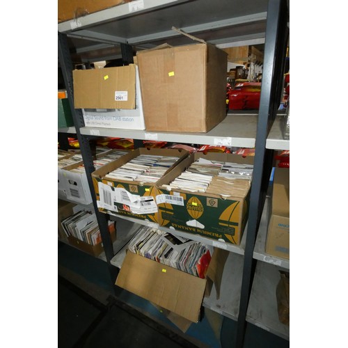 2561 - A quantity of various 45rpm single vinyl records, contents of 3 shelves