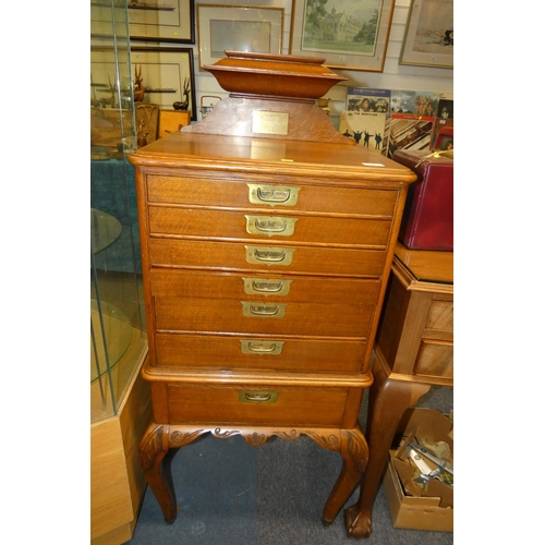 3178 - A vintage mahogany seven drawer cutlery cabinet with inset brass handles, each drawer with a fitted ... 