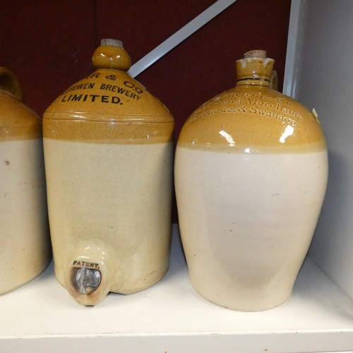 3011 - 6 large vintage named stoneware flagons and bottles (one shelf)