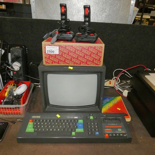 2500 - A vintage Amstrad 64k colour personal computer type CPC 464, comes with original monitor, user instr... 