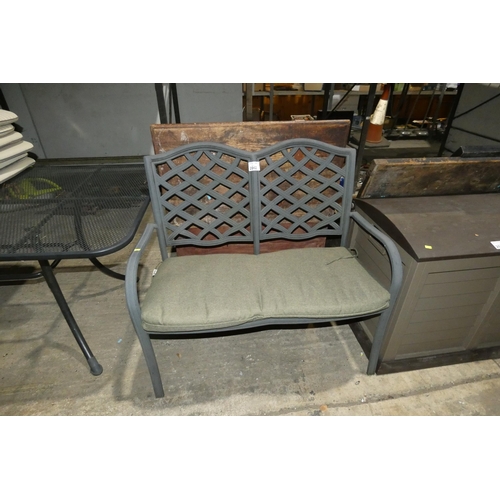 2062 - A metal garden bench with cushion approx 100cm wide