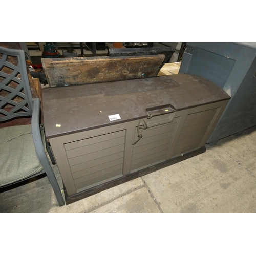 2063 - A brown plastic patio storage box