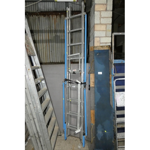 2077 - A double extending aluminium ladder with various accessories (2 x 9 rung)