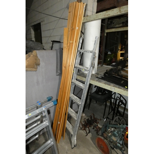 2082 - A quantity of various items including an aluminium ladder, pine architrave / dowel etc