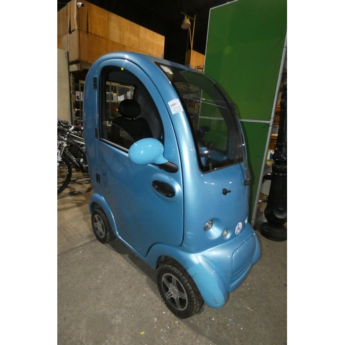 2097 - 1 x Scooter Pac Cabin Car battery powered mobility scooter supplied with a mains battery charger and... 