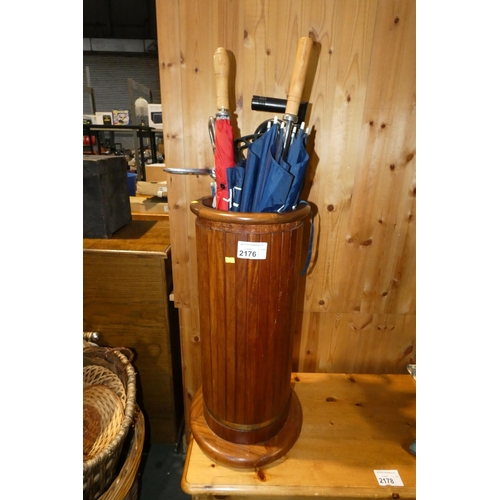 2176 - 1 x dark wood umbrella / stick stand containing various umbrellas etc