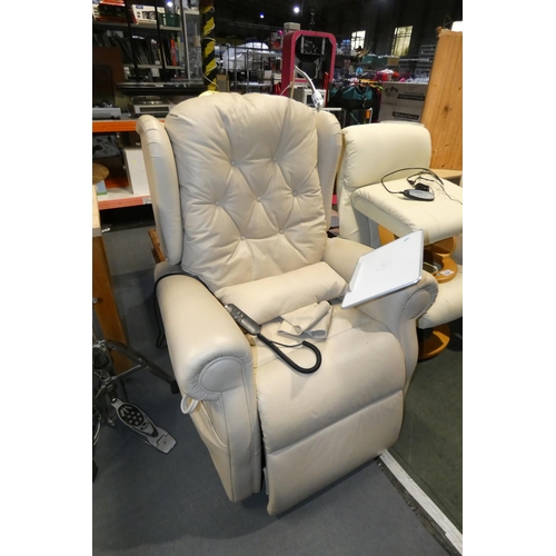 2187 - A cream upholstered electric reclining armchair with built in light and tablet table 240v (Trade)  T... 