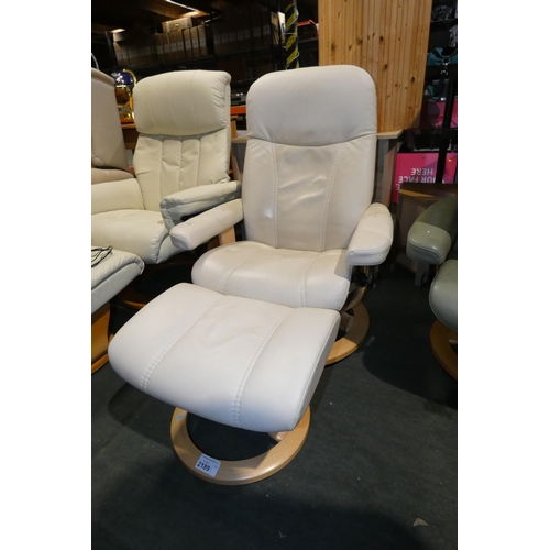 2189 - A Stressless cream upholstered reclining armchair and a matching foot stool