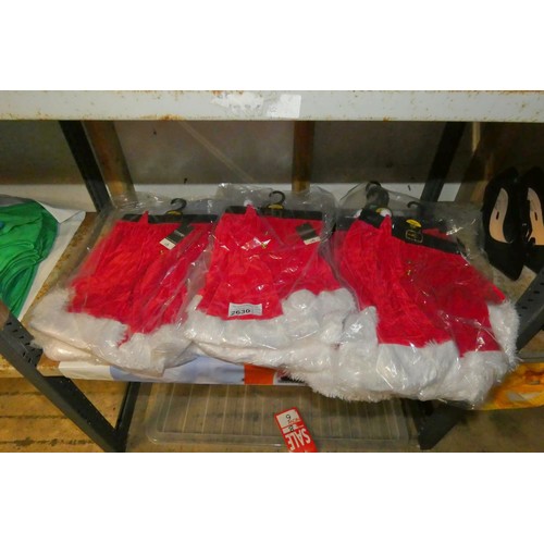 2630 - A quantity of size large Santa shorts and a matching hat, contents of 1 shelf