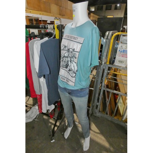 2670 - A full size manikin dressed in jeans and T-shirt