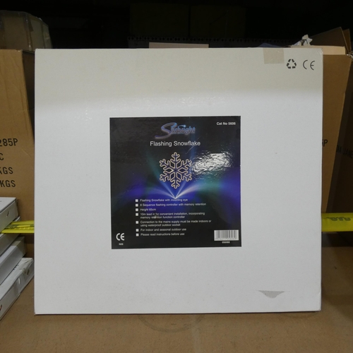 76 - An unused boxed 65cm flashing snowflake, Christmas decoration