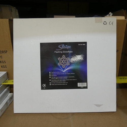 77 - An unused boxed 65cm flashing snowflake, Christmas decoration