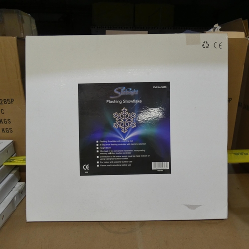 78 - An unused boxed 65cm flashing snowflake, Christmas decoration