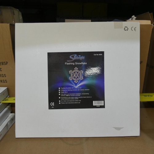 79 - An unused boxed 65cm flashing snowflake, Christmas decoration