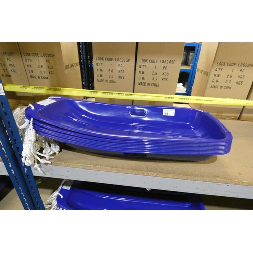 85 - 10 x blue plastic sledges by Kandytoys