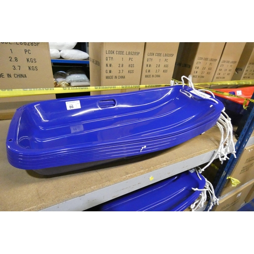 86 - 10 x blue plastic sledges by Kandytoys