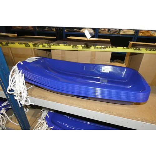 87 - 10 x blue plastic sledges by Kandytoys