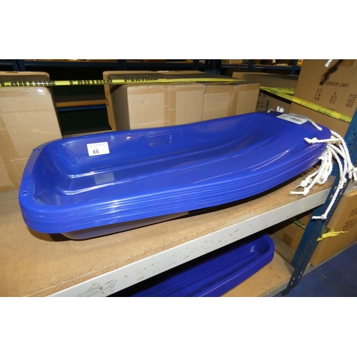 88 - 10 x blue plastic sledges by Kandytoys