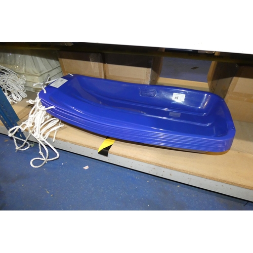 89 - 10 x blue plastic sledges by Kandytoys