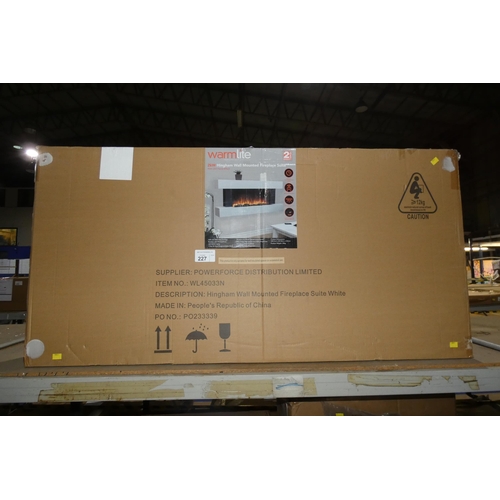 227 - An unused boxed white wall mounted electric fireplace by Warmlite type Hingham