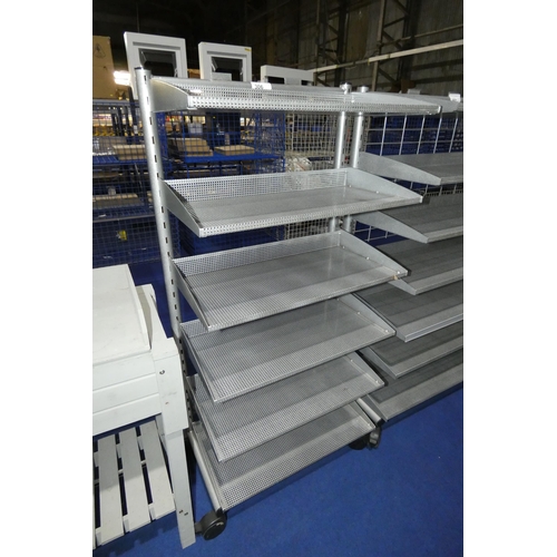 306 - A mobile silver coloured shop shelving unit with 6 shelves approx 70x42x43cm