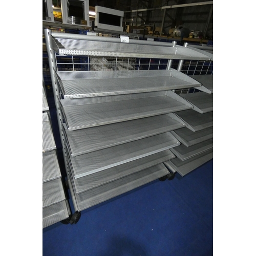 307 - A mobile silver coloured shop shelving unit with 7 shelves approx 100x42x43cm