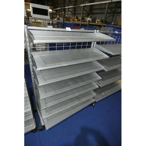 308 - A mobile silver coloured shop shelving unit with 7 shelves approx 100x42x43cm