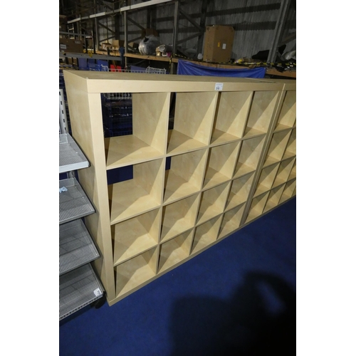 310 - A wood effect cubed shelving unit with 16 storage sections approx 150x39x150cm