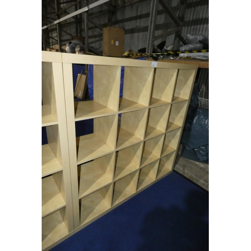 311 - A wood effect cubed shelving unit with 16 storage sections approx 150x39x150cm