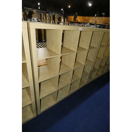 313 - A wood effect cubed shelving unit with 16 storage sections approx 150x39x150cm