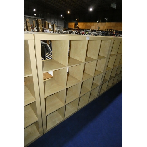 314 - A wood effect cubed shelving unit with 16 storage sections approx 150x39x150cm