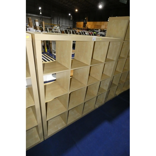 315 - A wood effect cubed shelving unit with 16 storage sections approx 150x39x150cm