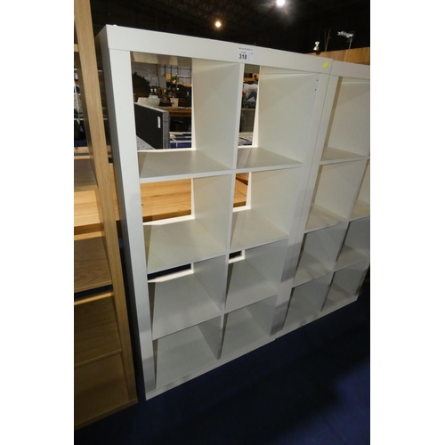 318 - A  white cubed shelving unit with 8 storage sections approx 79x39x150cm