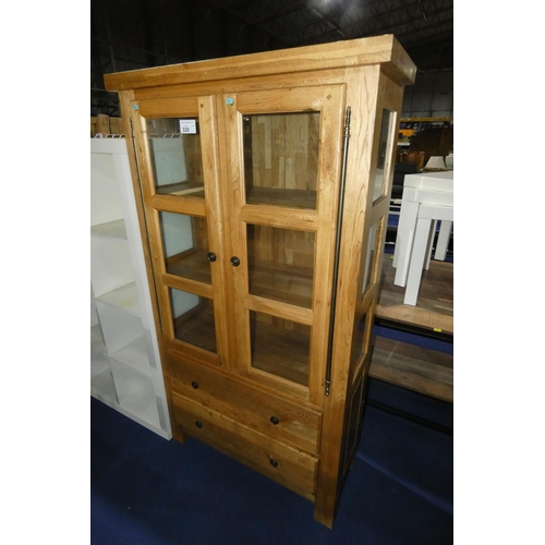 320 - A wooden glass fronted display cabinet with 2 drawers beneath approx 95x40x171