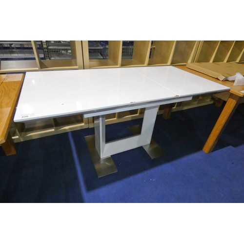 336 - A white dining table approx 158x78cm, please note small amount of damage on the top