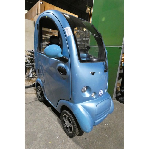 2097 - 1 x Scooter Pac Cabin Car battery powered mobility scooter supplied with a mains battery charger and... 