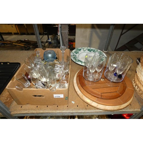 2109 - A quantity of various items including glass ware, metal ice buckets, metal candle sticks etc. Conten... 