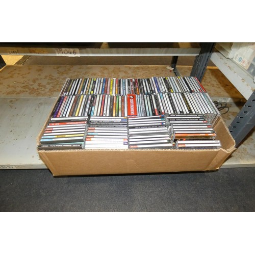 2445 - A large quantity of various DVDs and CDs, contents of 4 shelves