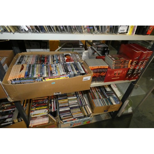 2448 - A quantity of various items including puzzles, books, Star Trek and Stargate magazines with DVDs, co... 