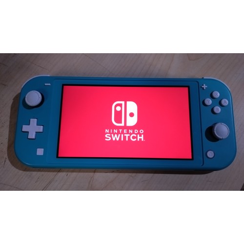 2526 - A Nintendo switch Lite console, boxed with charger & comes with an official Nintendo soft carry case... 